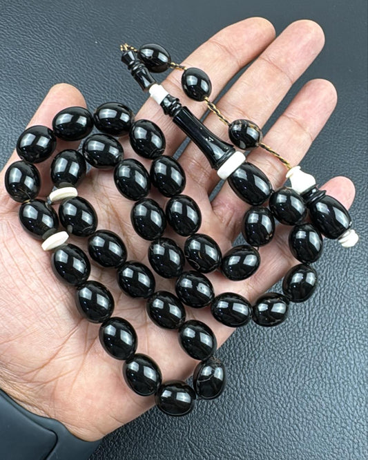 مسباح مرجان اسود طبيعي معشق بالعاج (يسر)