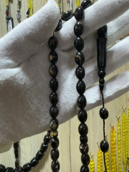 مسباح مرجان اسود طبيعي (يسر)